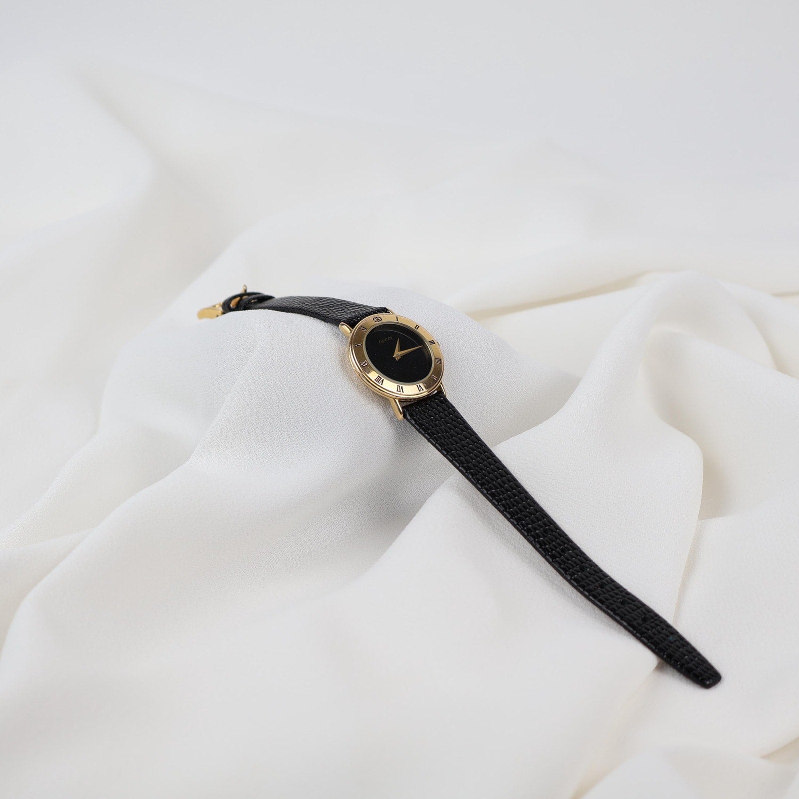 Stunning Vintage Gold Gucci Watch with Black Leather