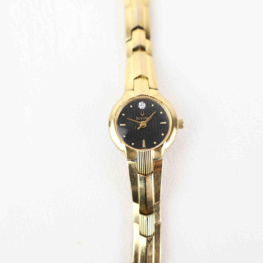 Vintage Bulova Black Face Watch – Gold Tone Bracelet (Working Battery)