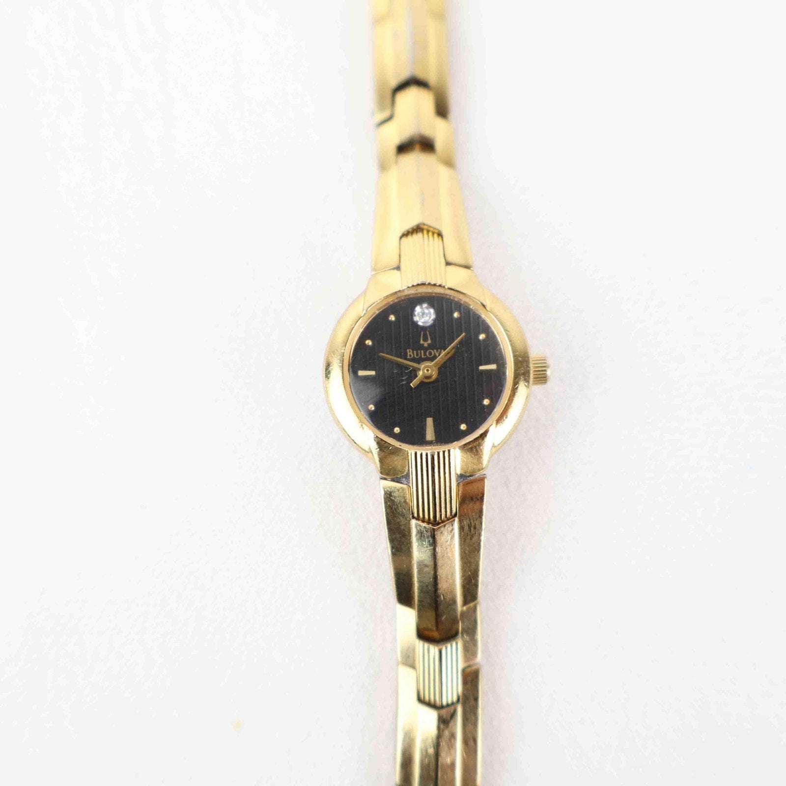 Vintage Bulova Black Face Watch – Gold Tone Bracelet (Working Battery)