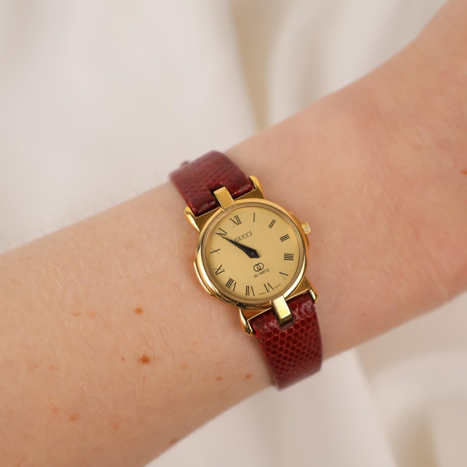 Stunning Vintage Gold Gucci Watch with Red Leather Strap