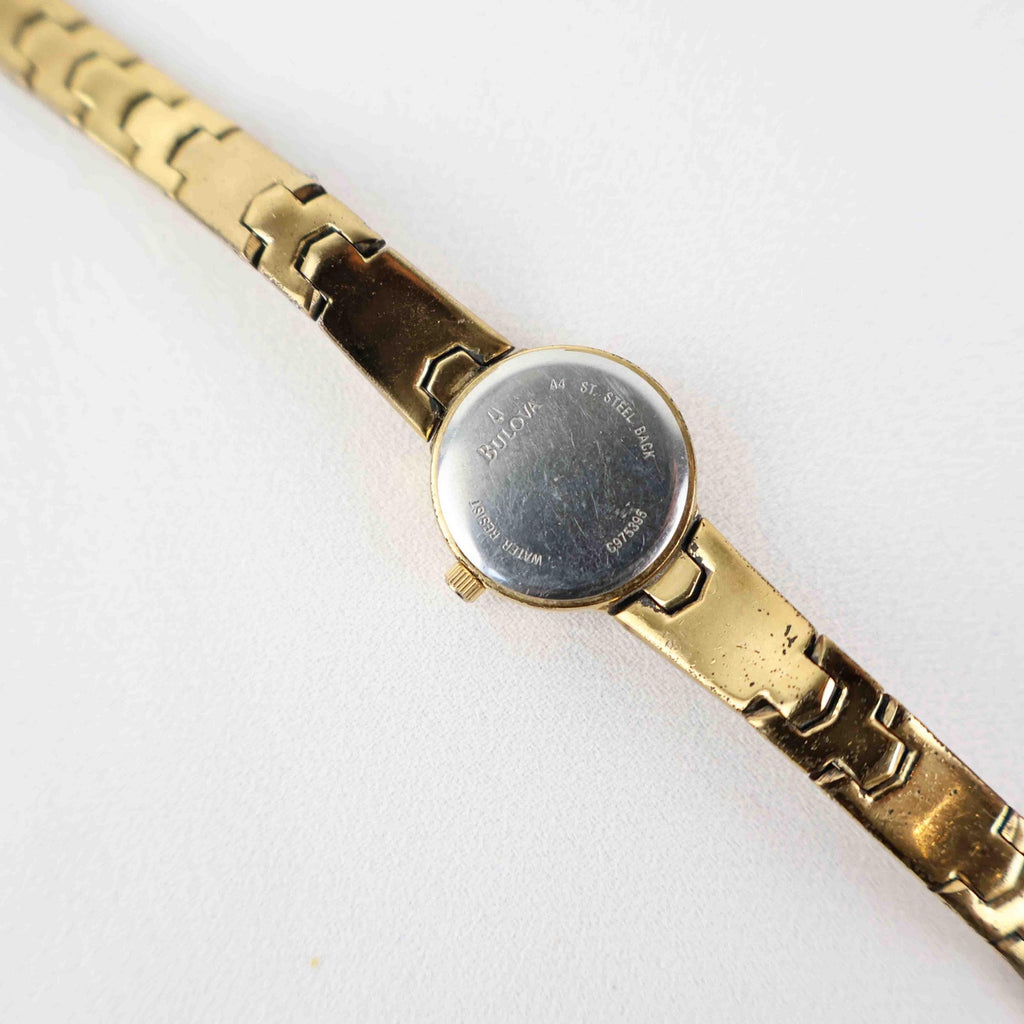 Vintage Bulova Black Face Watch – Gold Tone Bracelet (Working Battery)