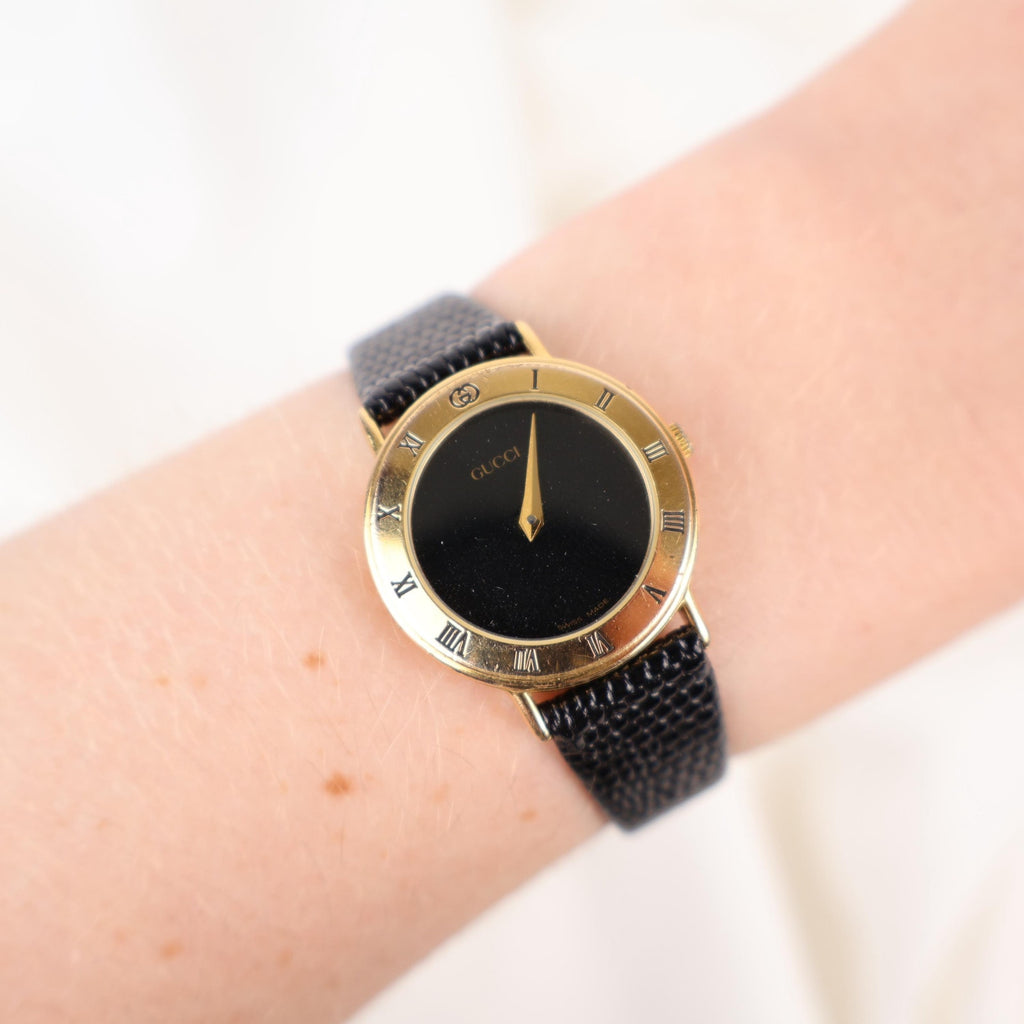 Stunning Vintage Gold Gucci Watch with Black Leather