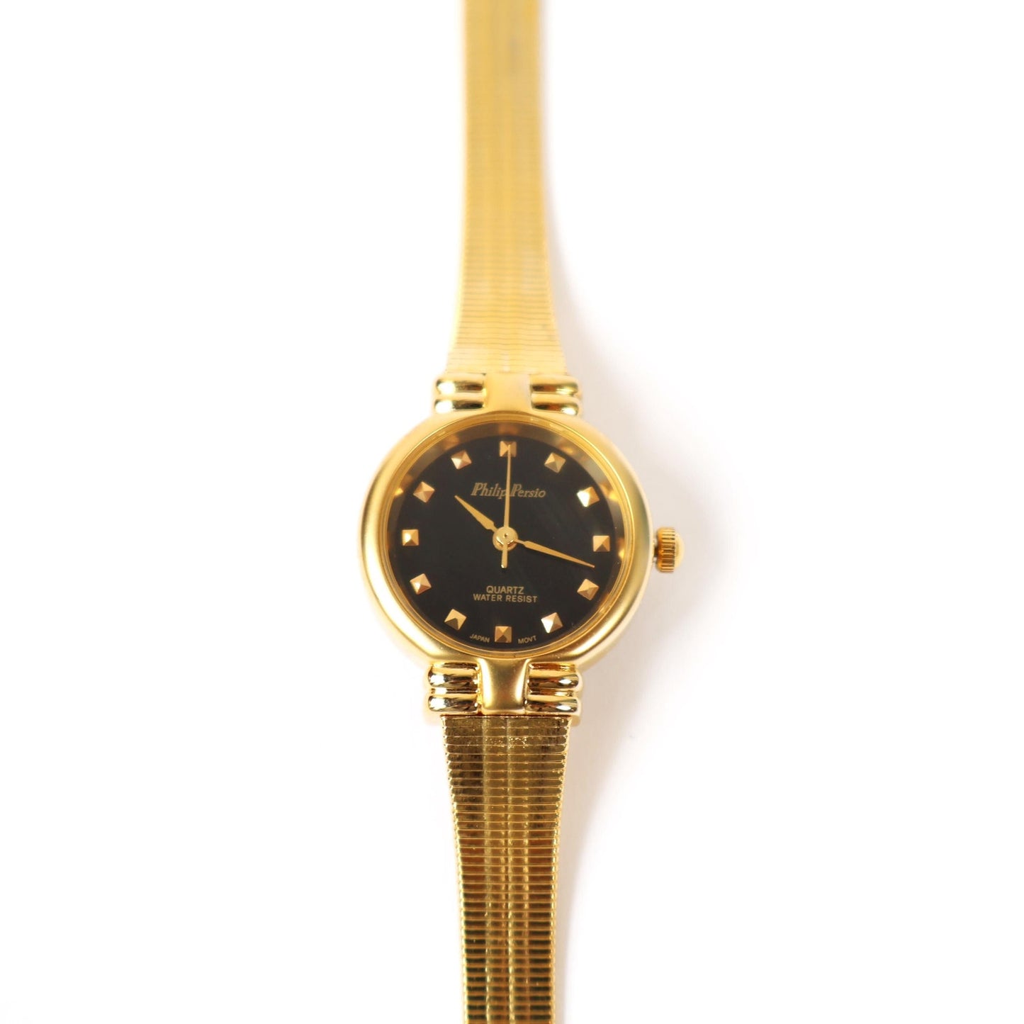 Vintage Gold Watch with Black Round Face | Philip Persio