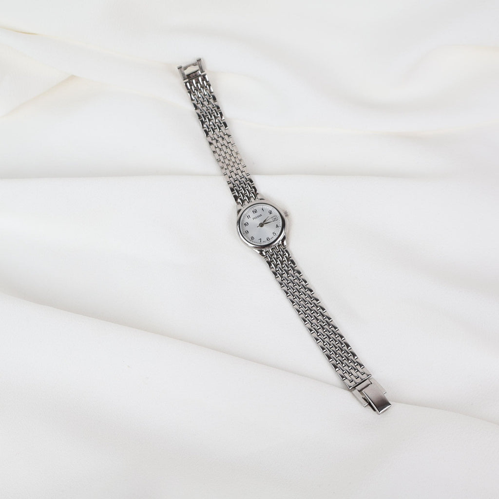Vintage Silver Pulsar Watch with a Round Face