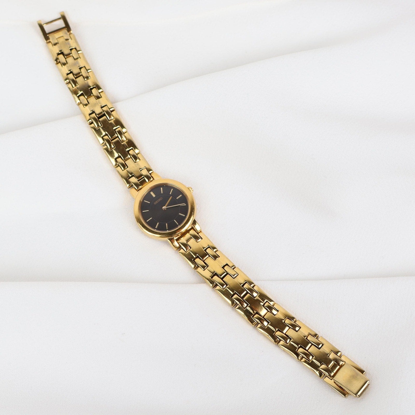 Stunning Vintage Gold Seiko Watch With a Black Round Face