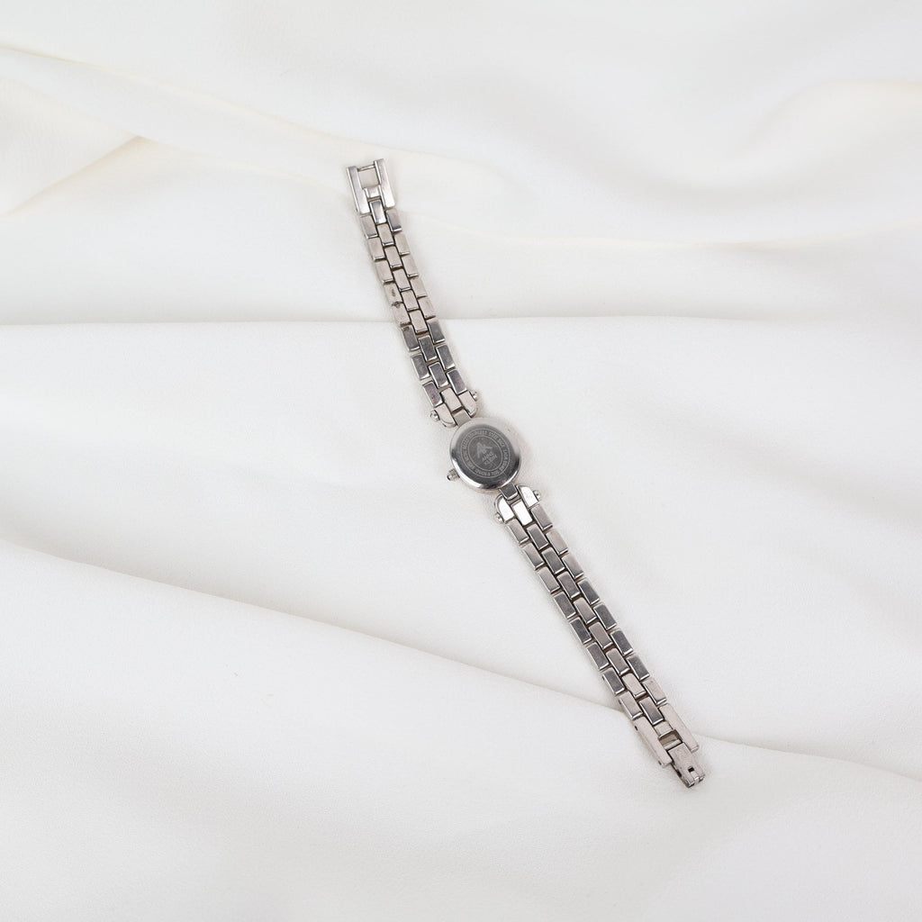 Vintage Silver Anne Klein Watch with an Oval Shaped Face