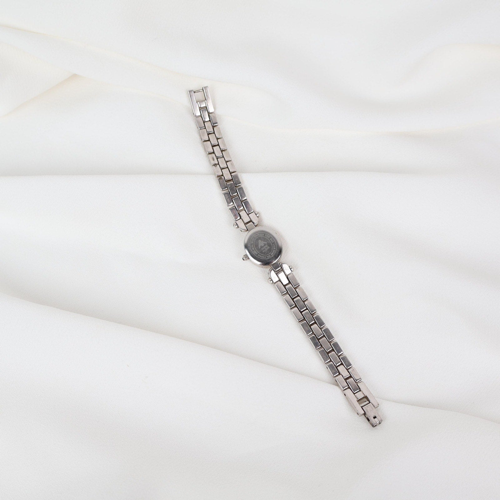 Vintage Silver Anne Klein Watch with an Oval Shaped Face