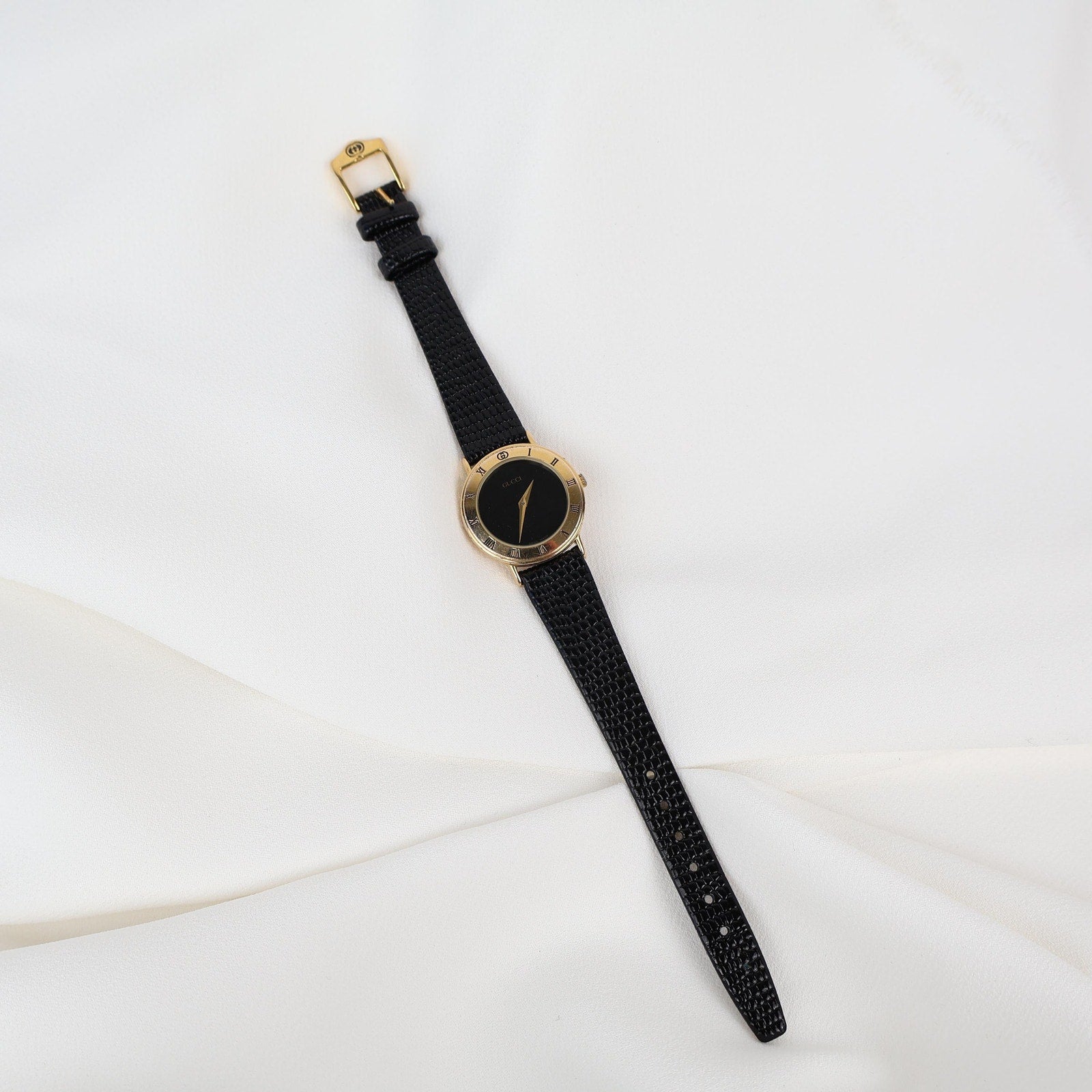 Stunning Vintage Gold Gucci Watch with Black Leather
