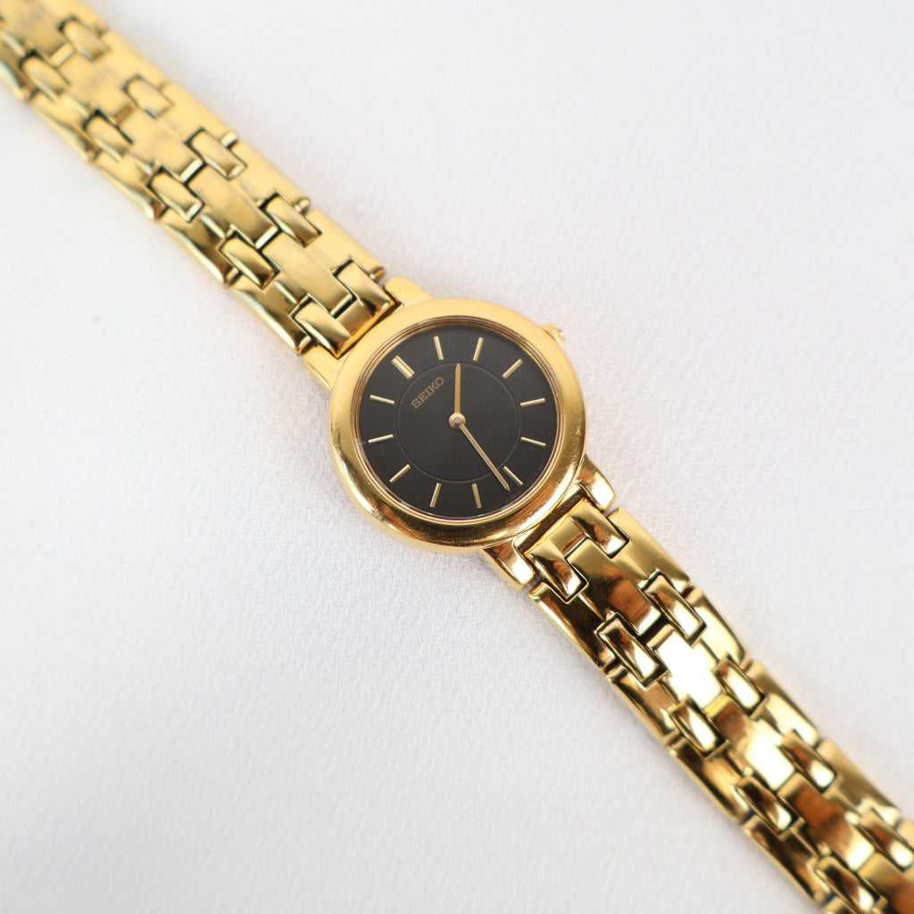 Stunning Vintage Gold Seiko Watch With a Black Round Face