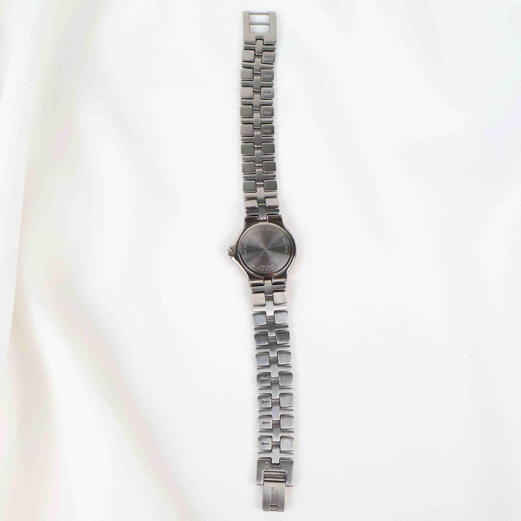 Vintage Silver Tone Bulova Watch with Round White Watch Face