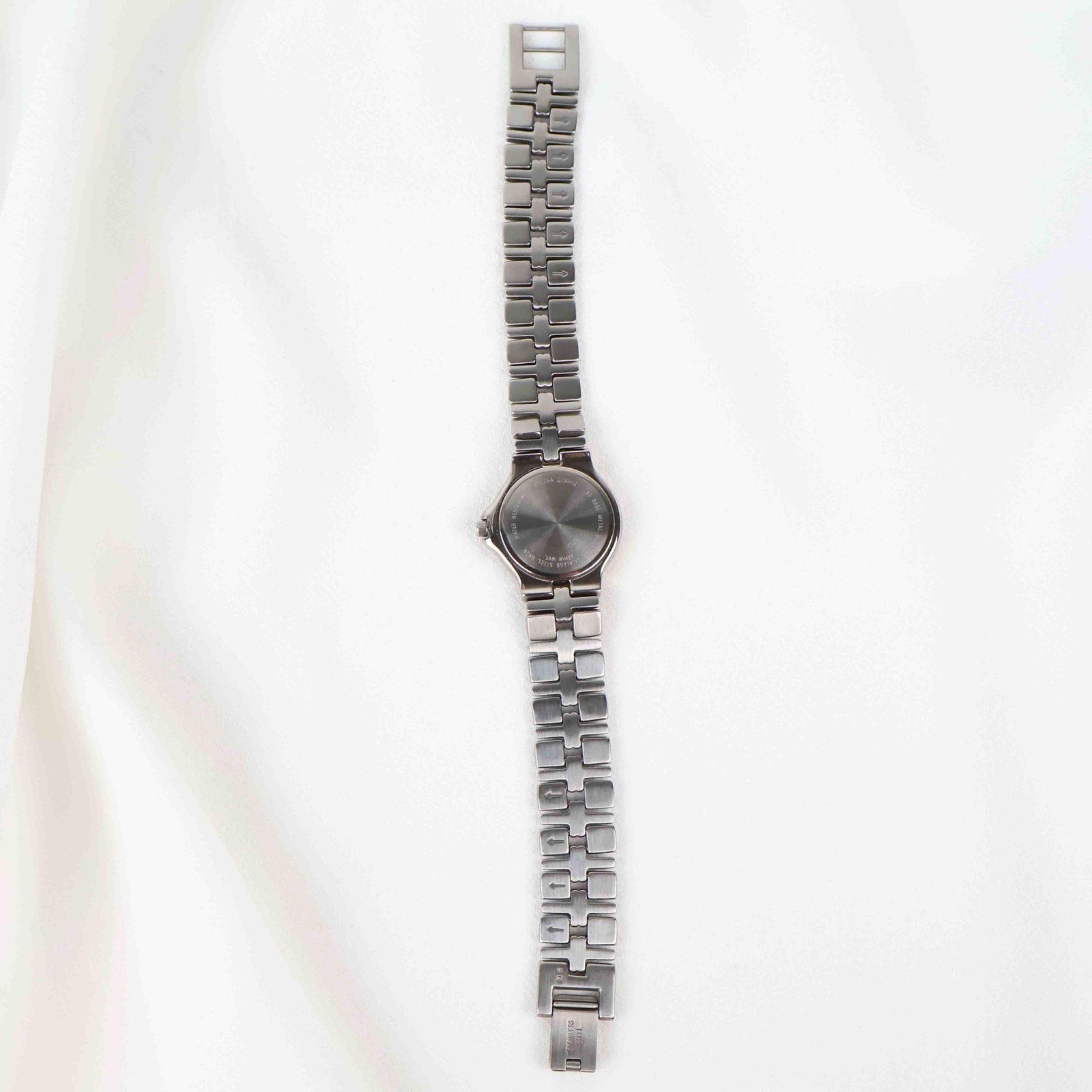Vintage Silver Tone Bulova Watch with Round White Watch Face