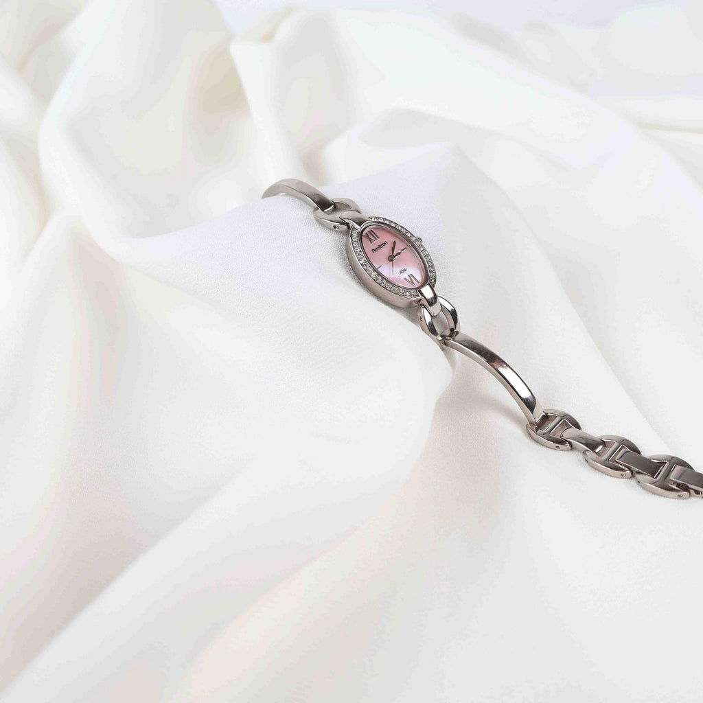 Vintage Silver Armitron Watch with Pink Oval Face, Japanese Movement