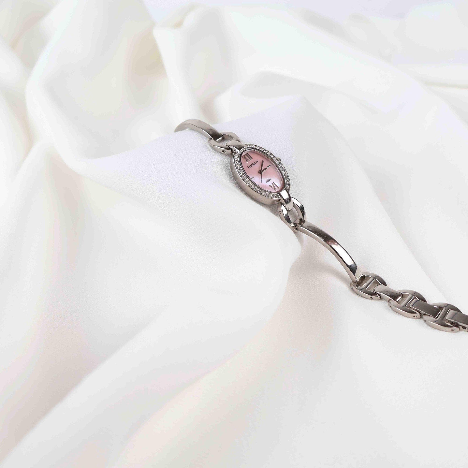 Vintage Silver Armitron Watch with Pink Oval Face, Japanese Movement
