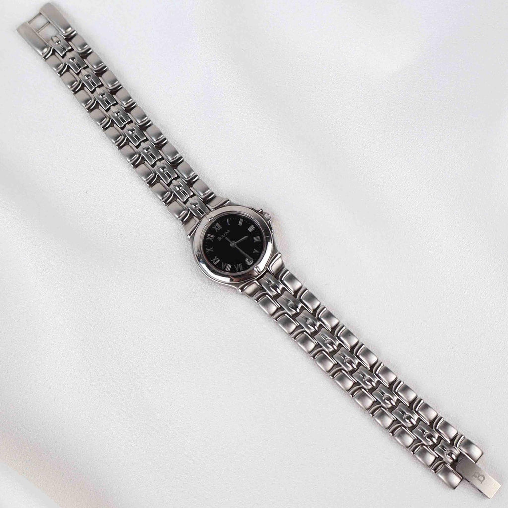 Vintage Silver Tone Bulova Watch with Round Black Watch Face