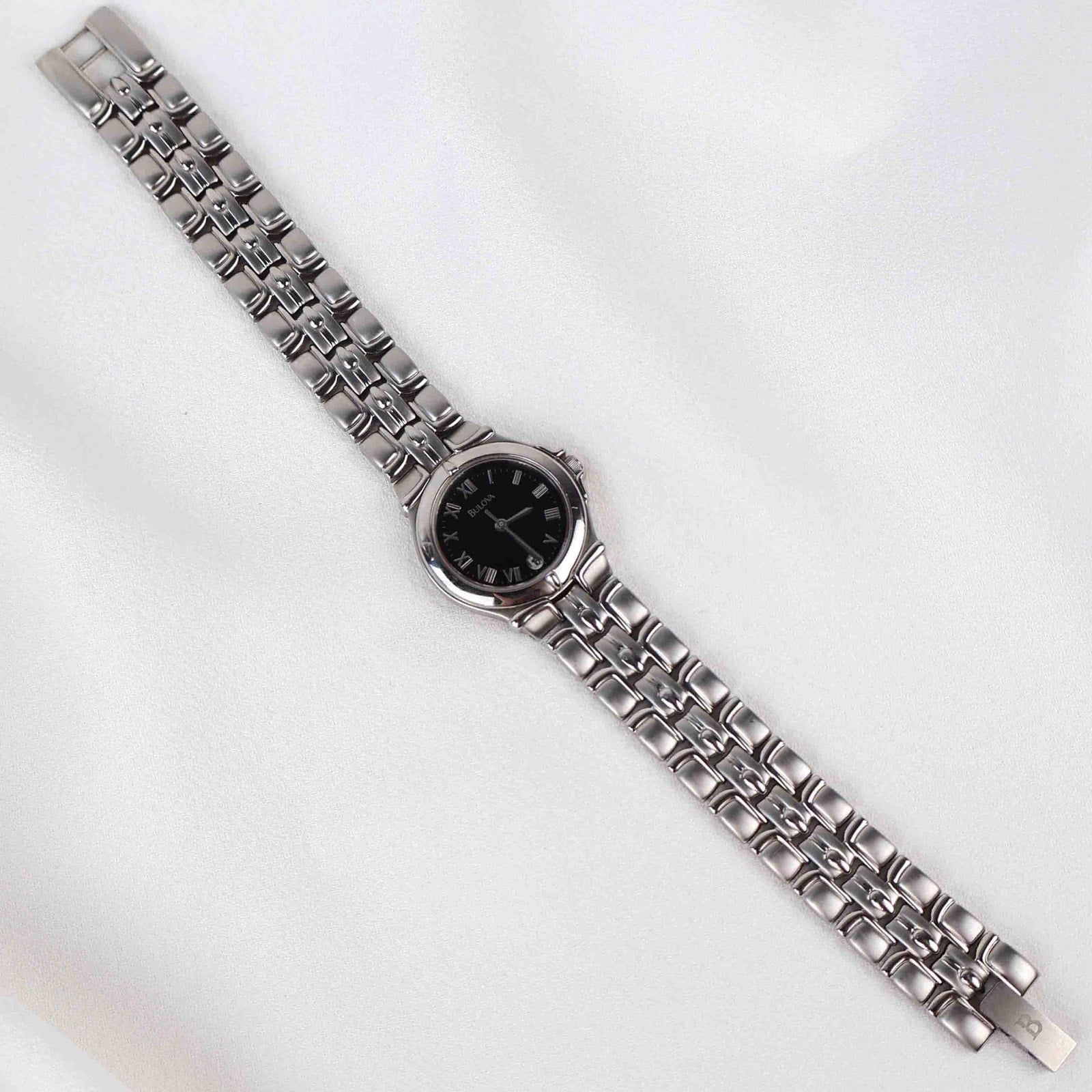 Vintage Silver Tone Bulova Watch with Round Black Watch Face