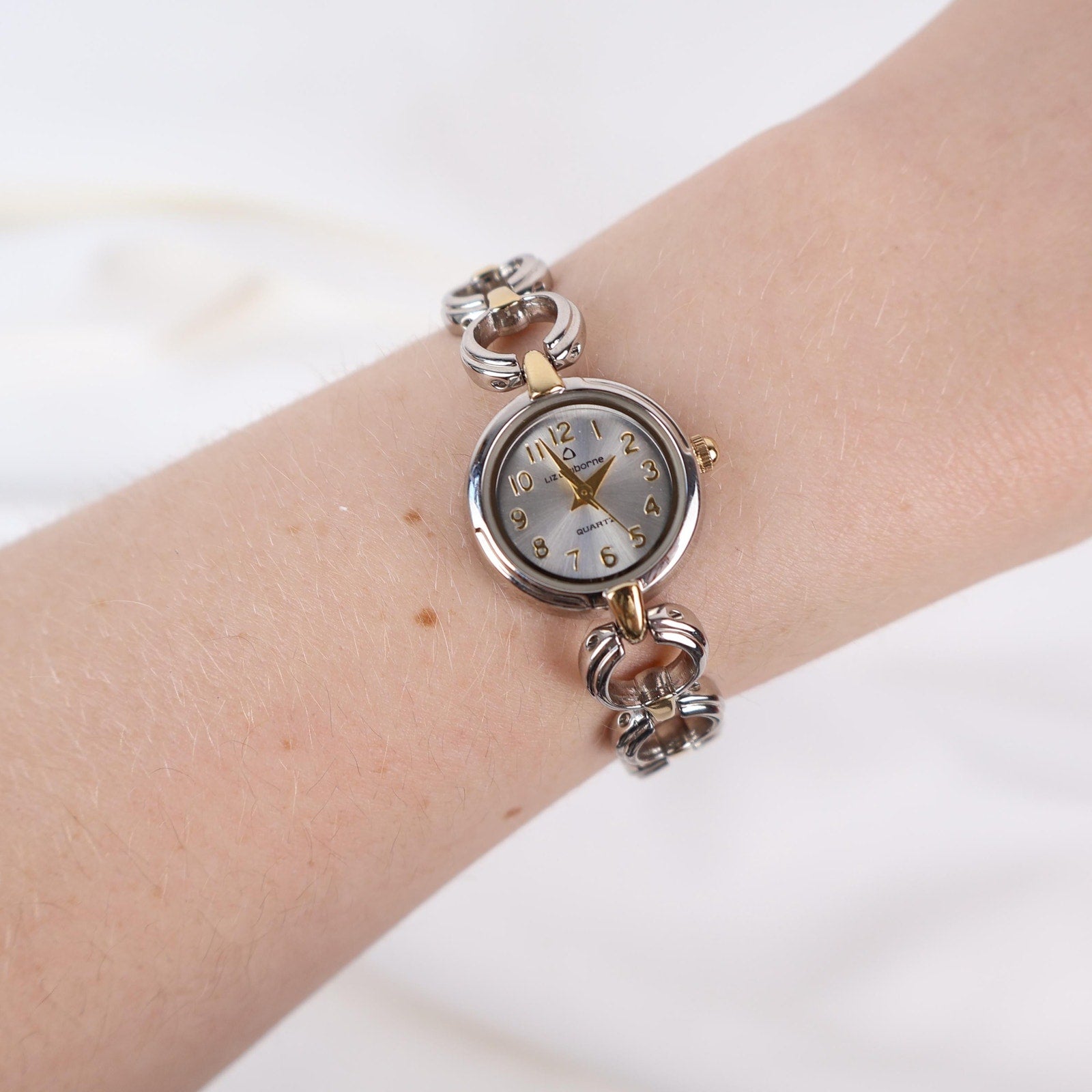 Vintage Two Tone Liz Claiborne Watch with a Round Face and Chain Look