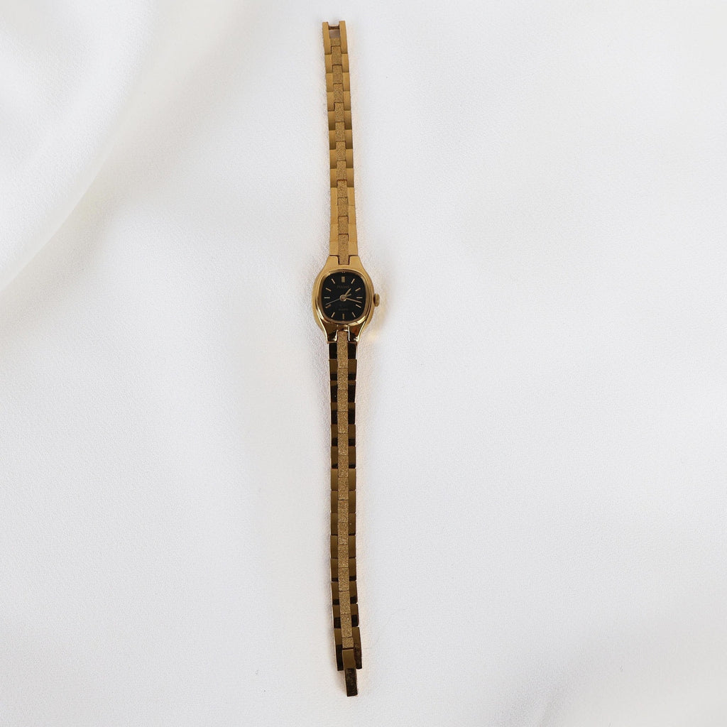 Vintage Black and Gold Pulsar Watch