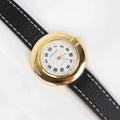 Vintage Embassy Watch with a Gold Round Face and Black Leather Strap