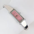 Vintage Silver Gucci Horse-Bit Watch with a Pink Opalesent Face