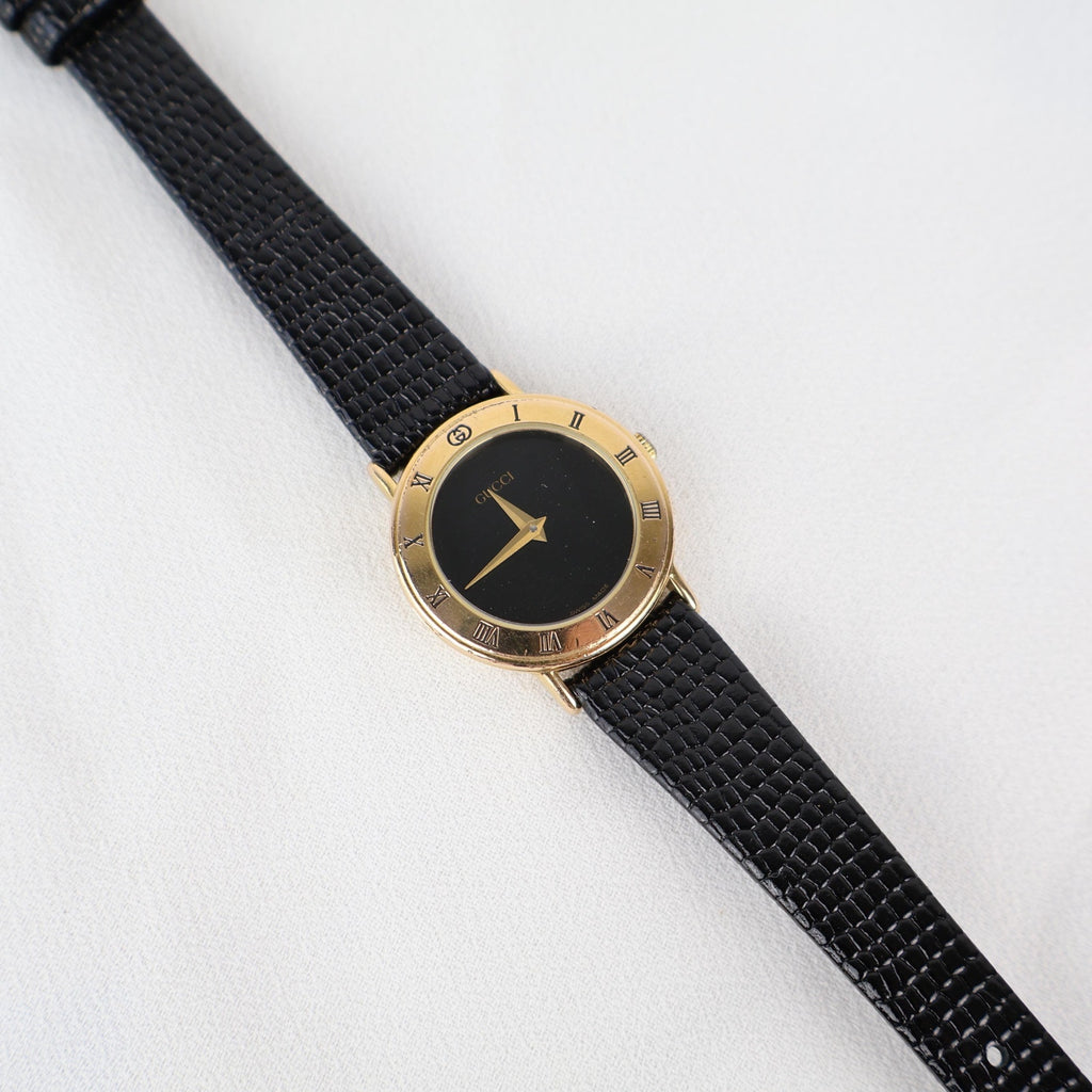Stunning Vintage Gold Gucci Watch with Black Leather