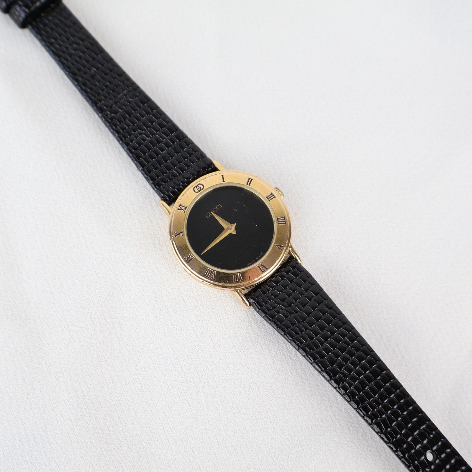 Stunning Vintage Gold Gucci Watch with Black Leather