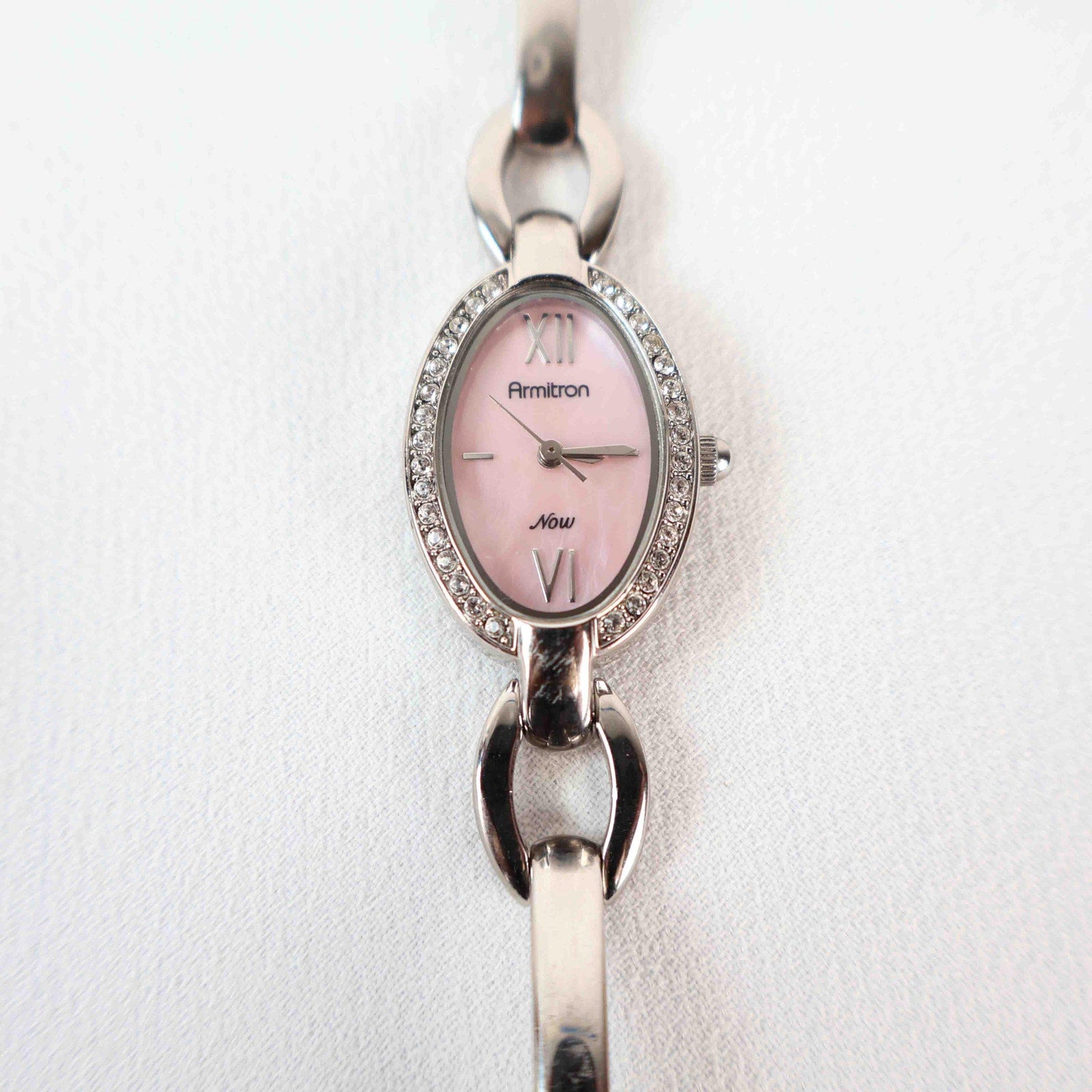 Vintage Silver Armitron Watch with Pink Oval Face, Japanese Movement