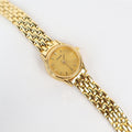 Vintage Gold Tone Pulsar Watch with a Circle Face