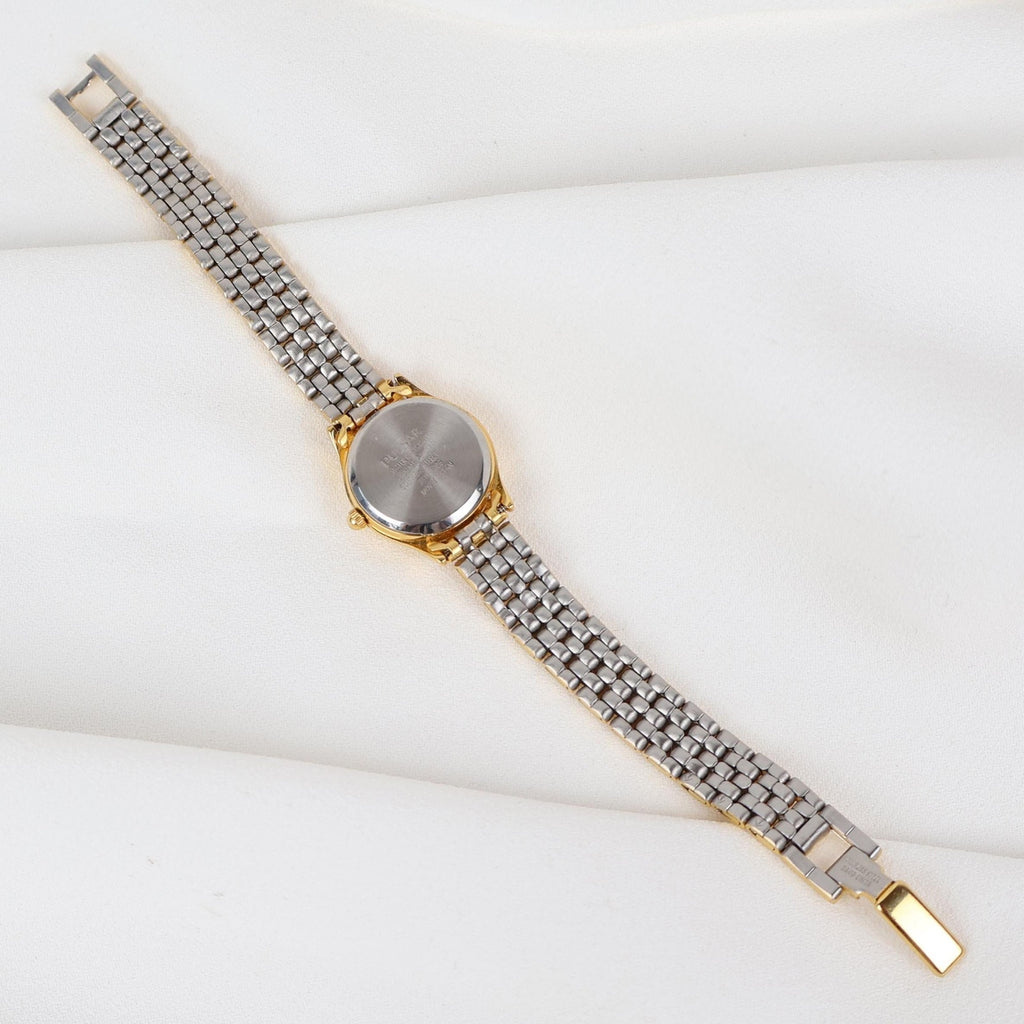 Vintage Gold Tone Pulsar Watch with a Circle Face