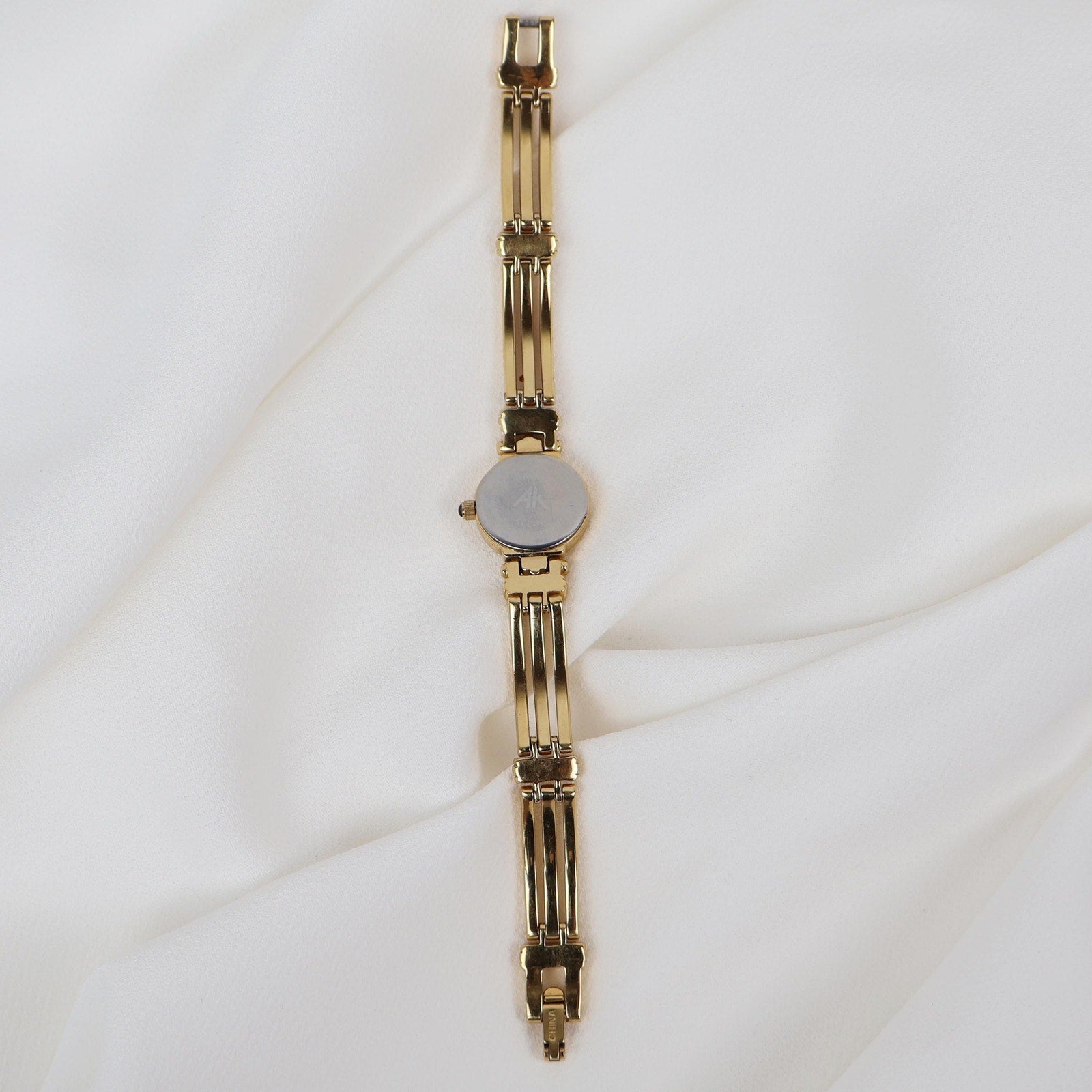 Vintage Gold Tone Anne Klein Watch with Mother of Pearl Face