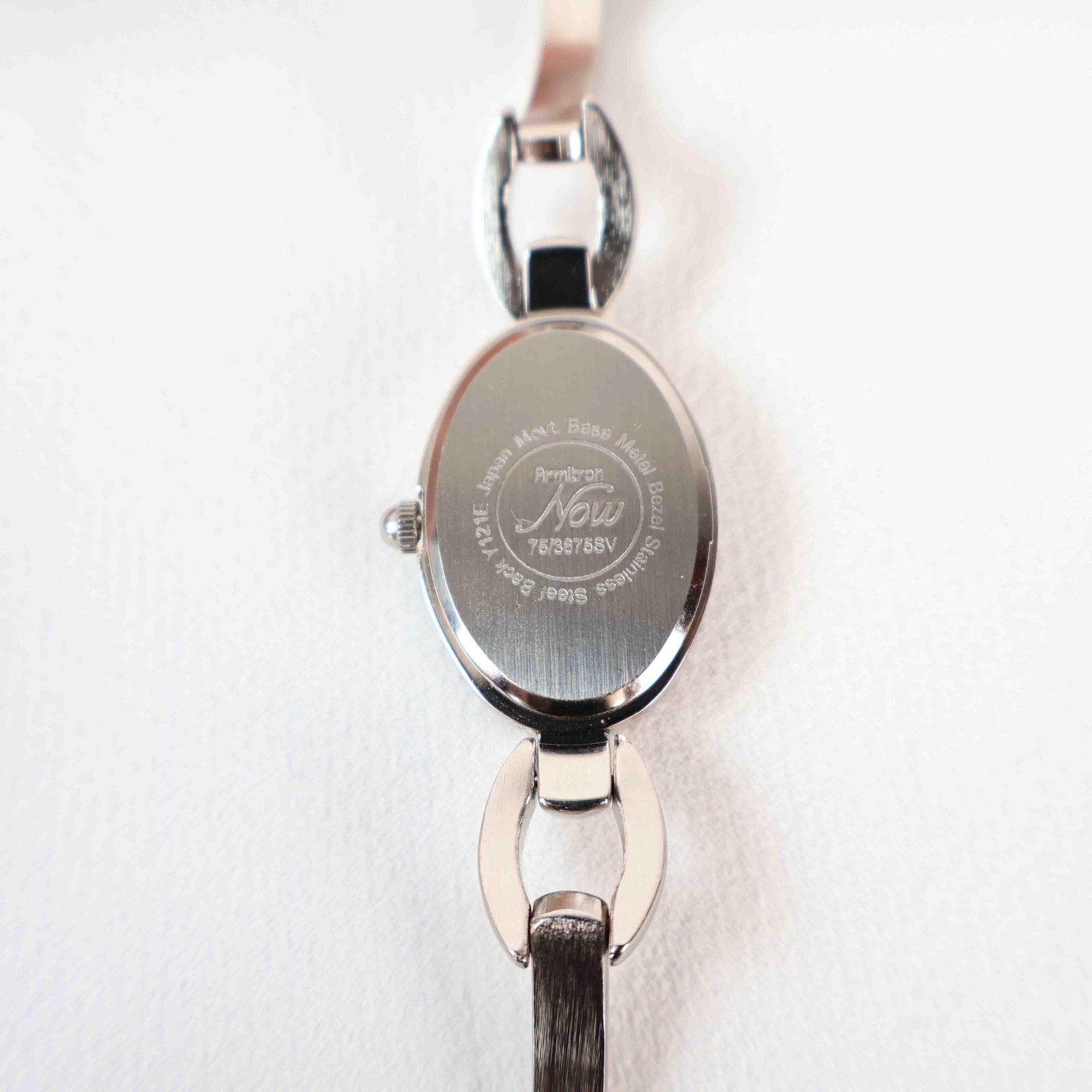 Vintage Silver Armitron Watch with Pink Oval Face, Japanese Movement