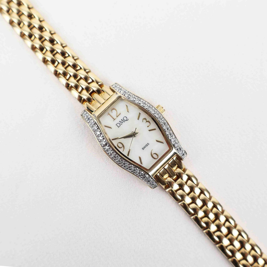 Vintage DMQ Oval Face Watch – Gold Tone Bracelet (Working Battery)