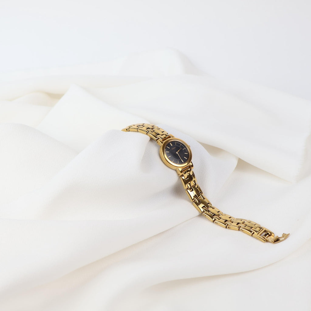 Stunning Vintage Gold Seiko Watch With a Black Round Face