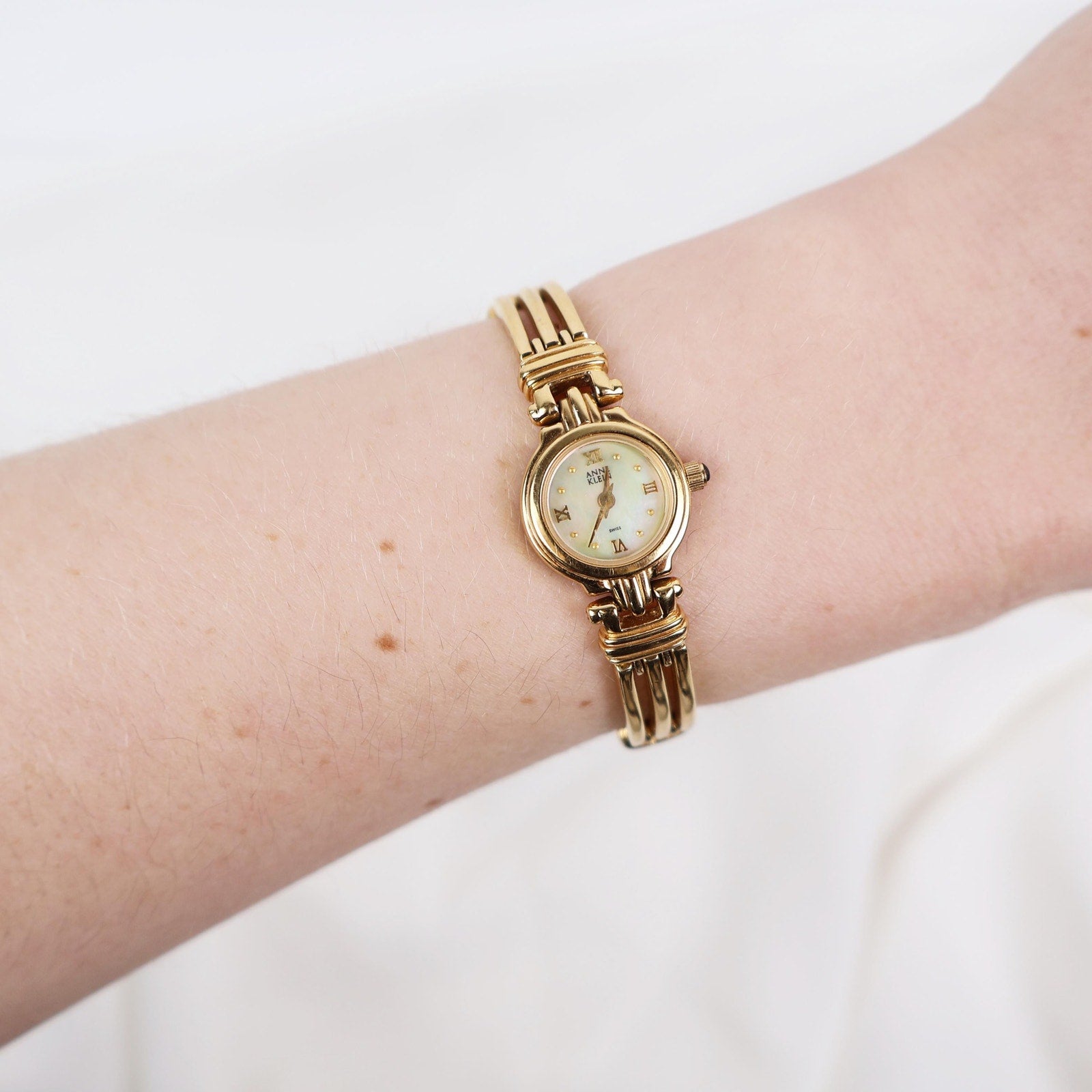 Vintage Gold Tone Anne Klein Watch with Mother of Pearl Face