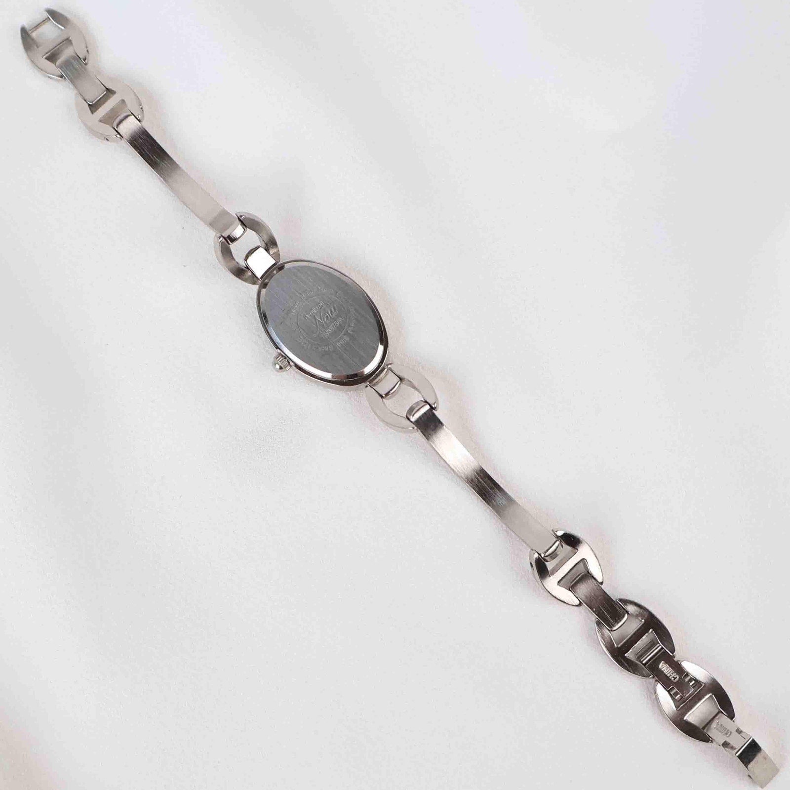 Vintage Silver Armitron Watch with Pink Oval Face, Japanese Movement