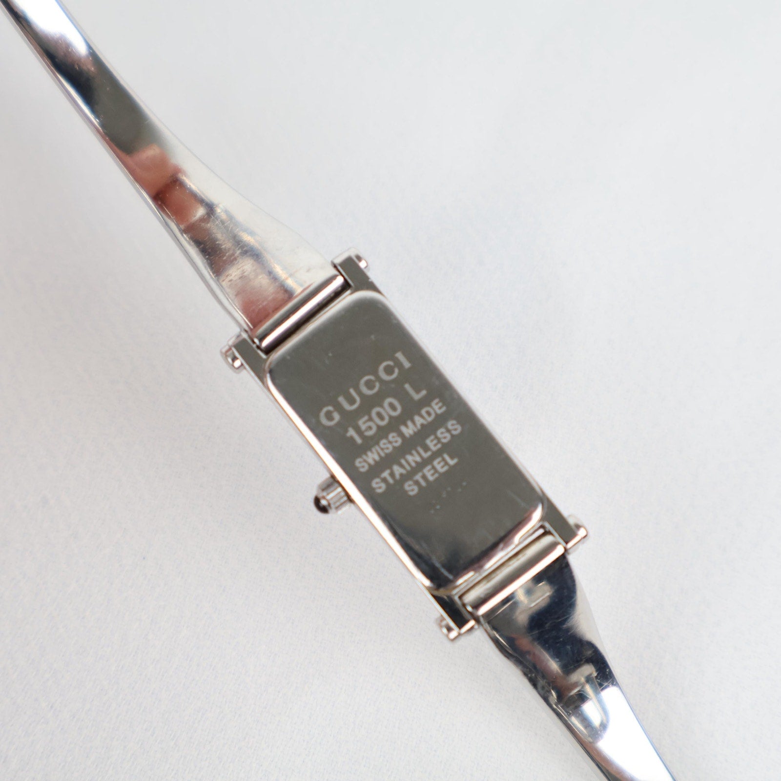Vintage Silver Gucci Horse-Bit Watch with a Pink Opalesent Face