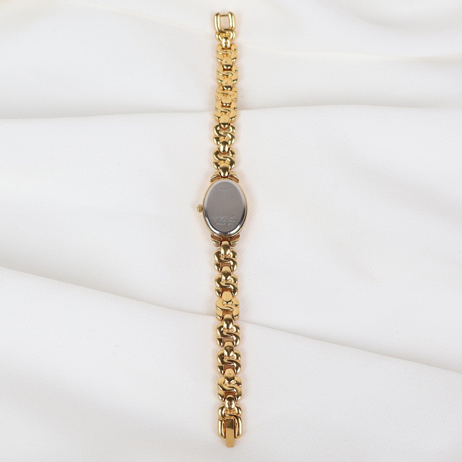 Vintage Gold Tone Caravelle by Bulova Watch with an Oval Face