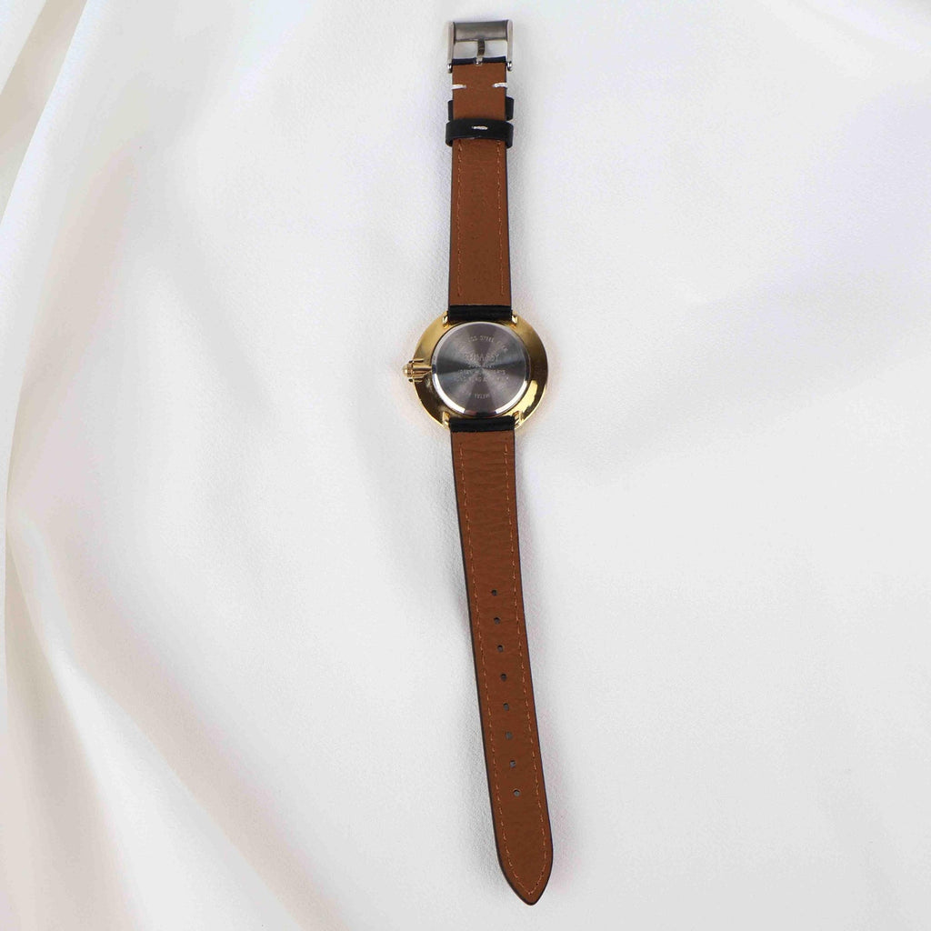 Vintage Embassy Watch with a Gold Round Face and Black Leather Strap