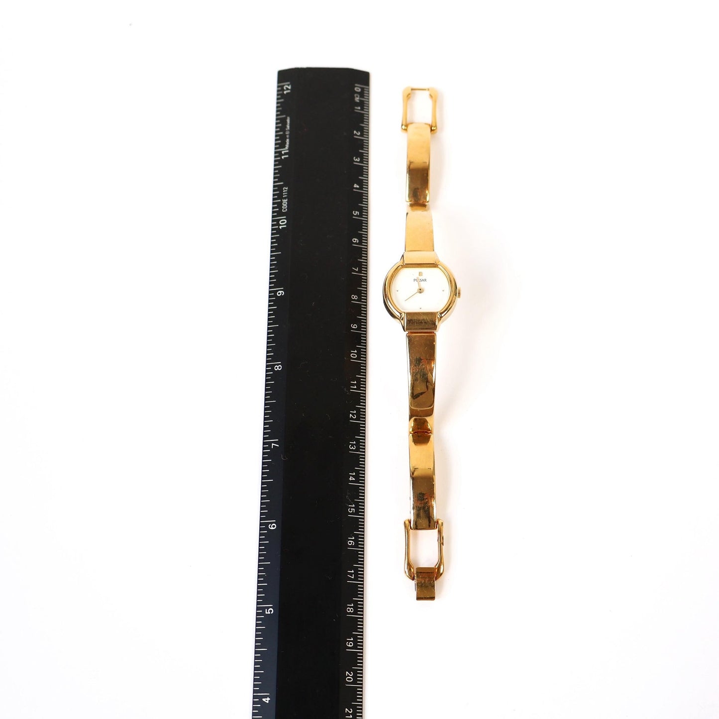 Vintage Gold Cuff Watch with White Round Face | PULSAR