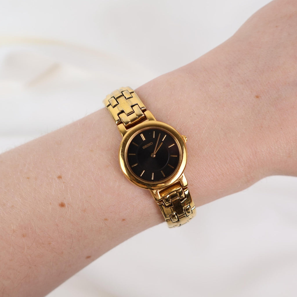 Stunning Vintage Gold Seiko Watch With a Black Round Face