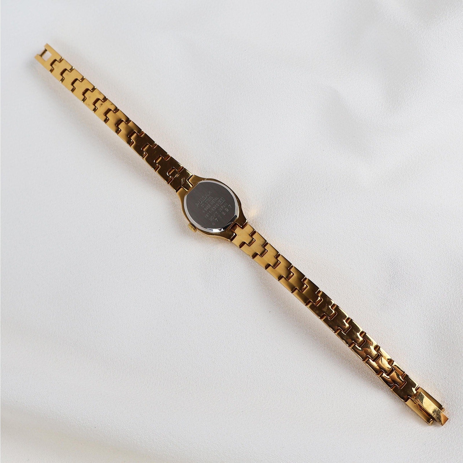 Vintage Black and Gold Pulsar Watch