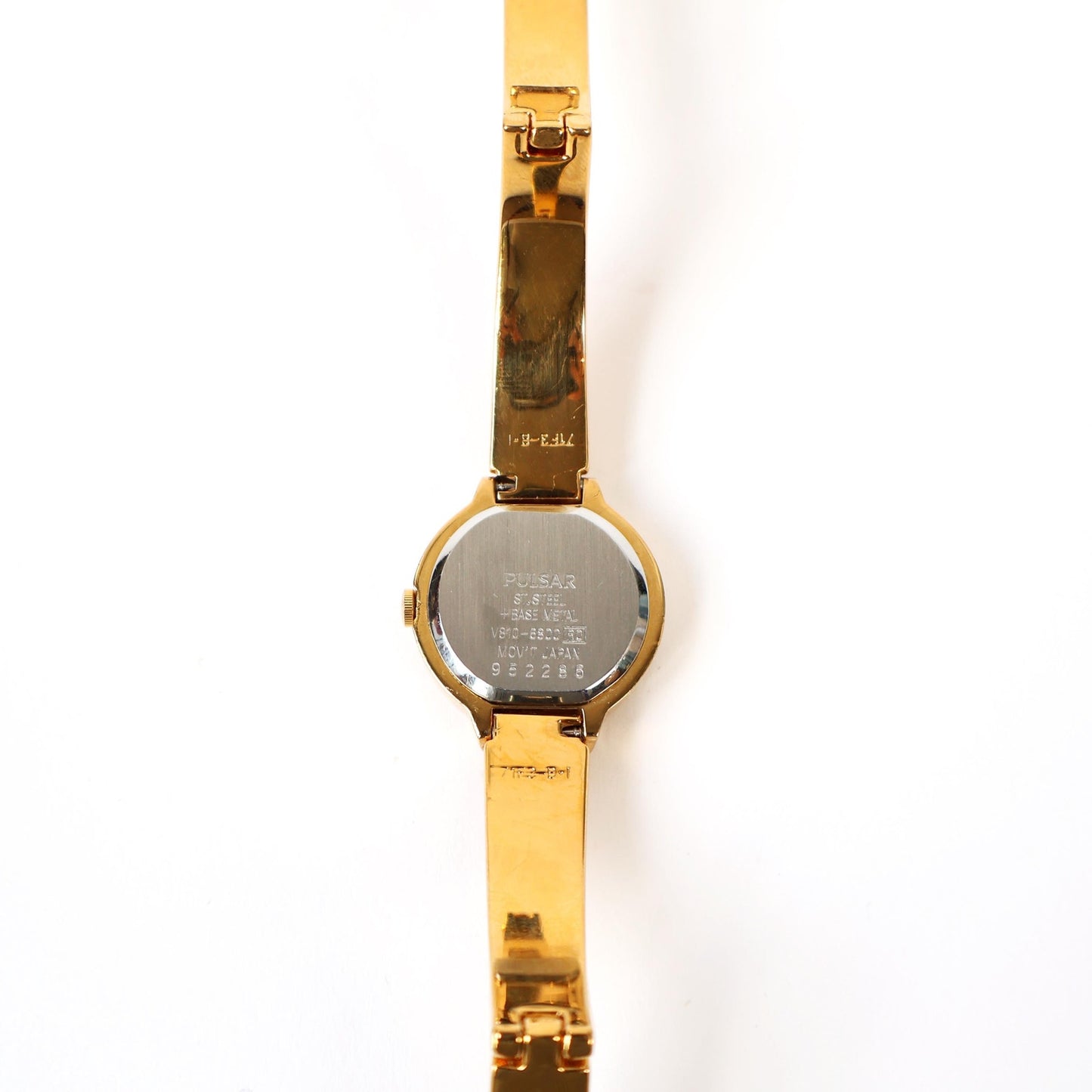 Vintage Gold Cuff Watch with White Round Face | PULSAR