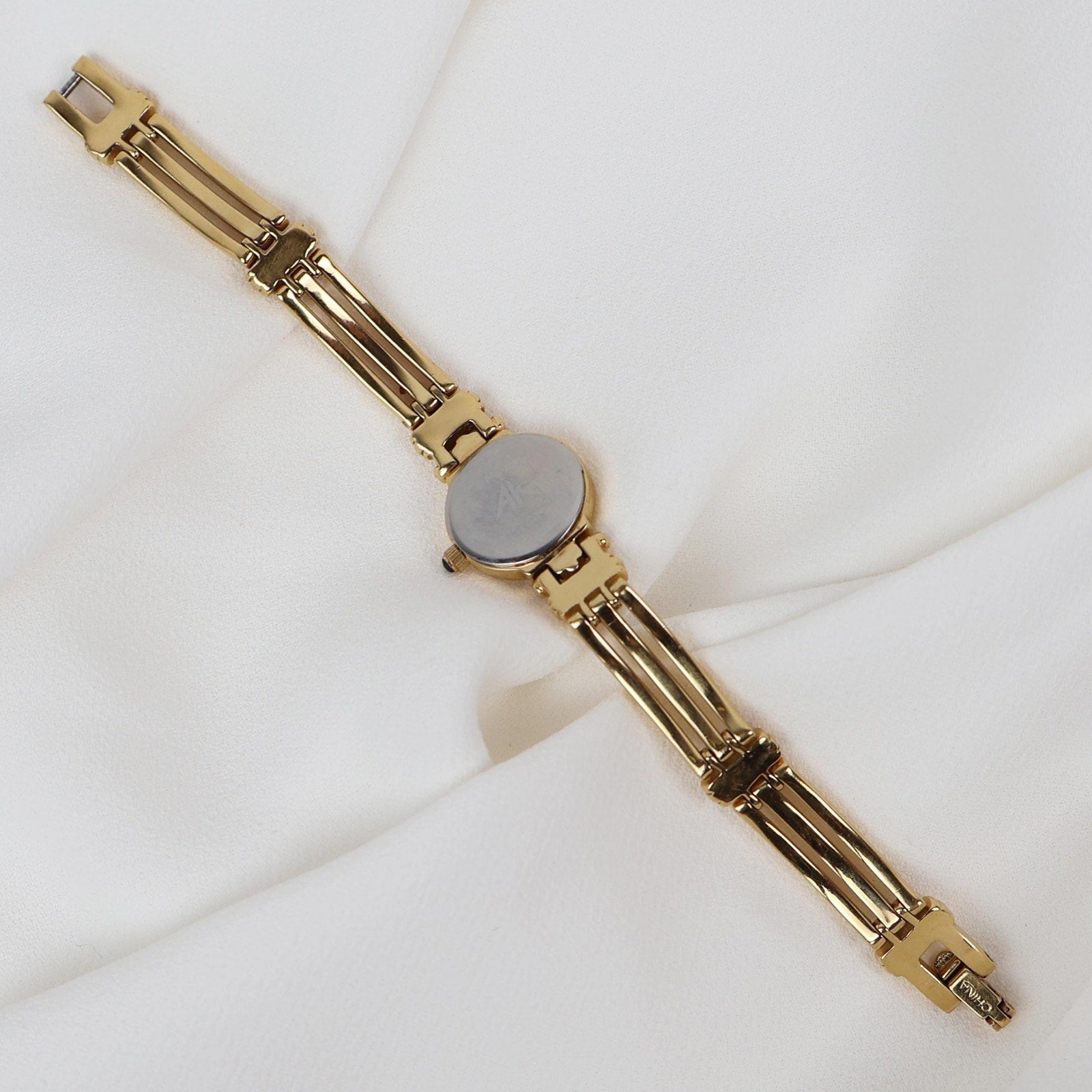Vintage Gold Tone Anne Klein Watch with Mother of Pearl Face