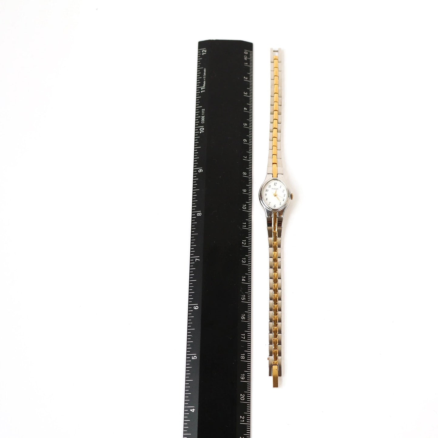 Vintage Two-Toned Watch with White Oval Face | PULSAR