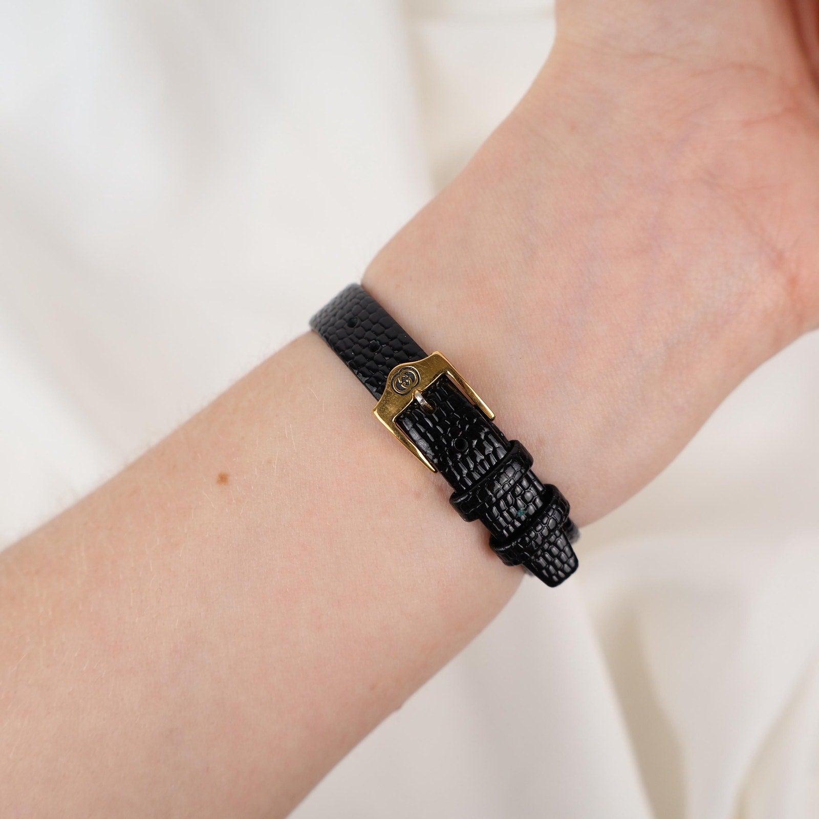 Stunning Vintage Gold Gucci Watch with Black Leather