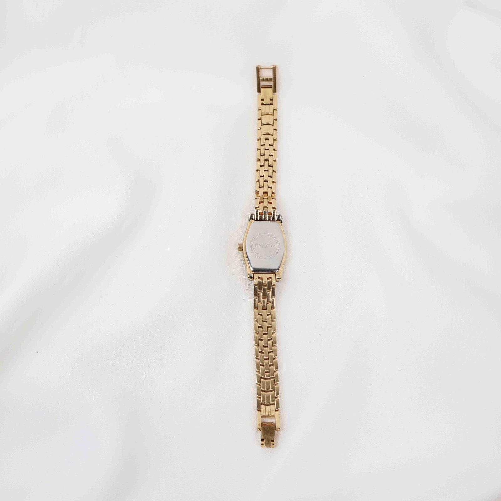 Vintage DMQ Oval Face Watch – Gold Tone Bracelet (Working Battery)