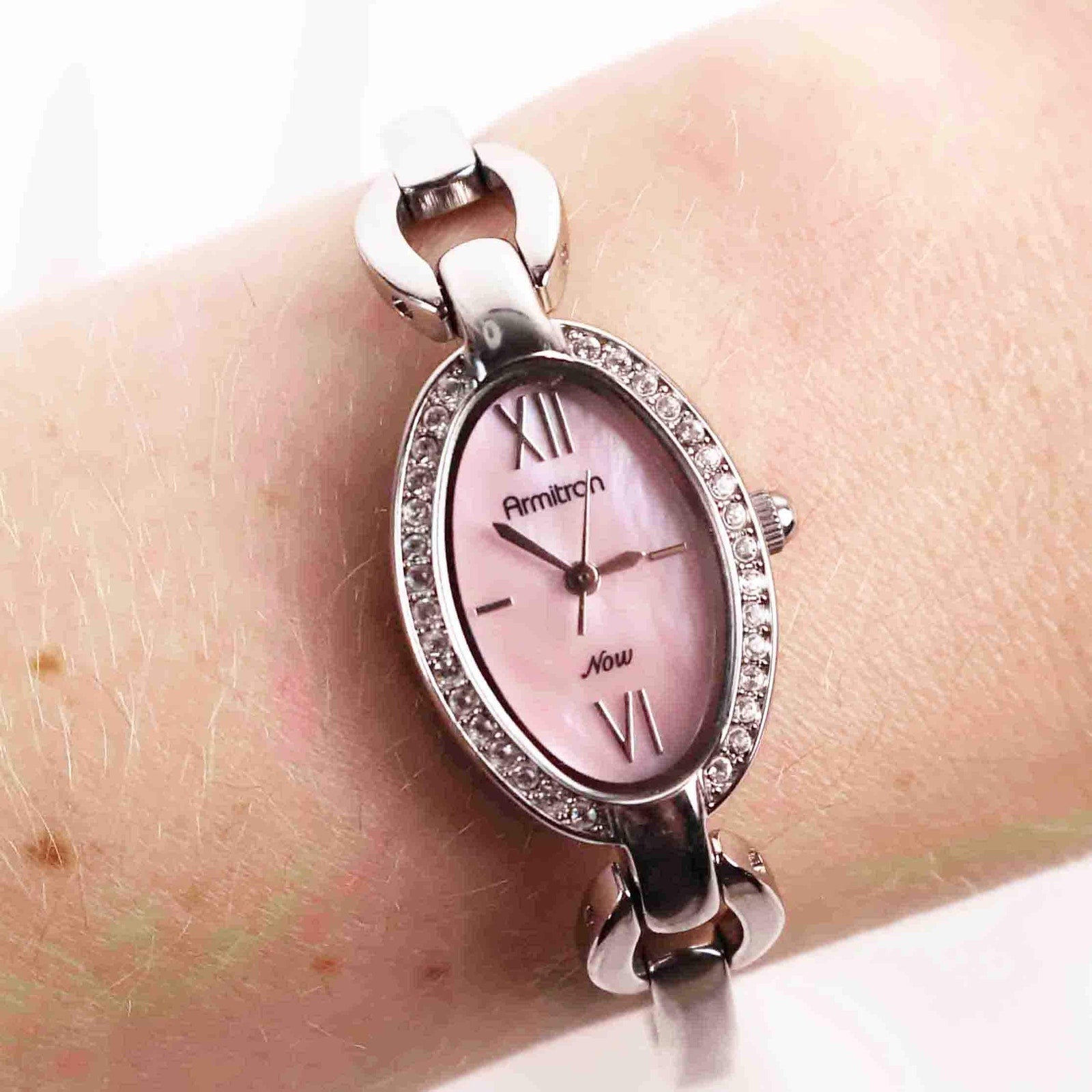 Vintage Silver Armitron Watch with Pink Oval Face, Japanese Movement