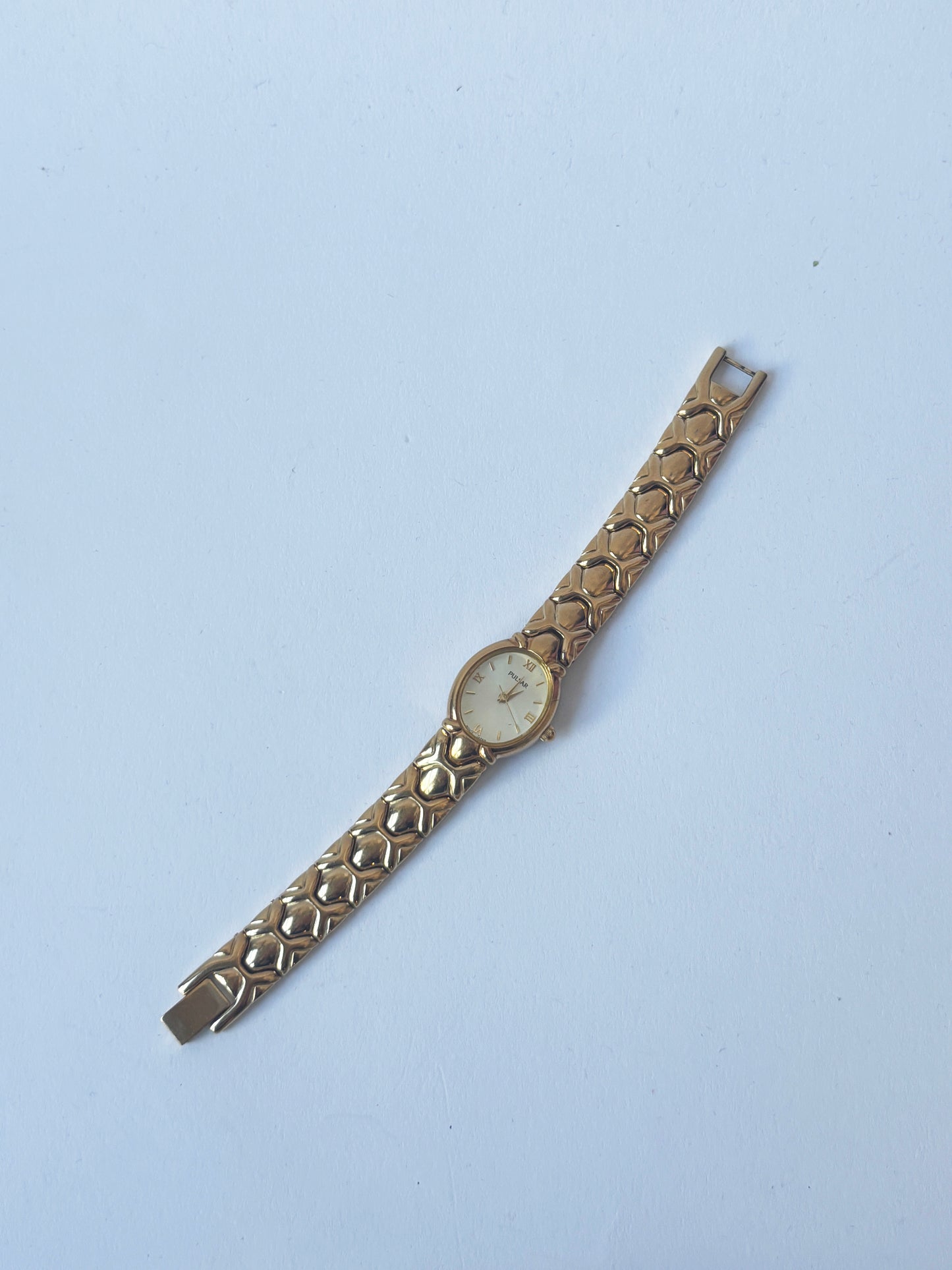 Vintage Gold Toned Pulsar with Oval Face