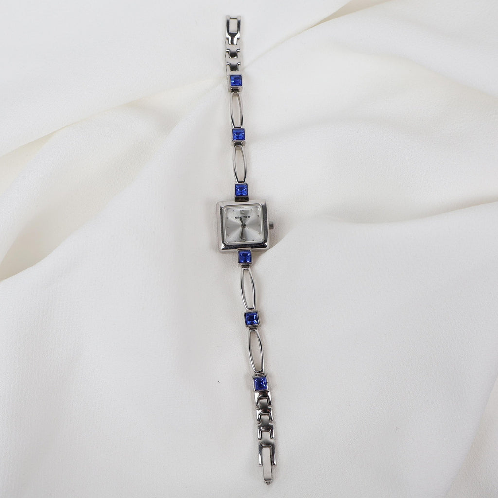 Vintage Silver Nine West Bracelet Watch with Blue Gem Embellishments