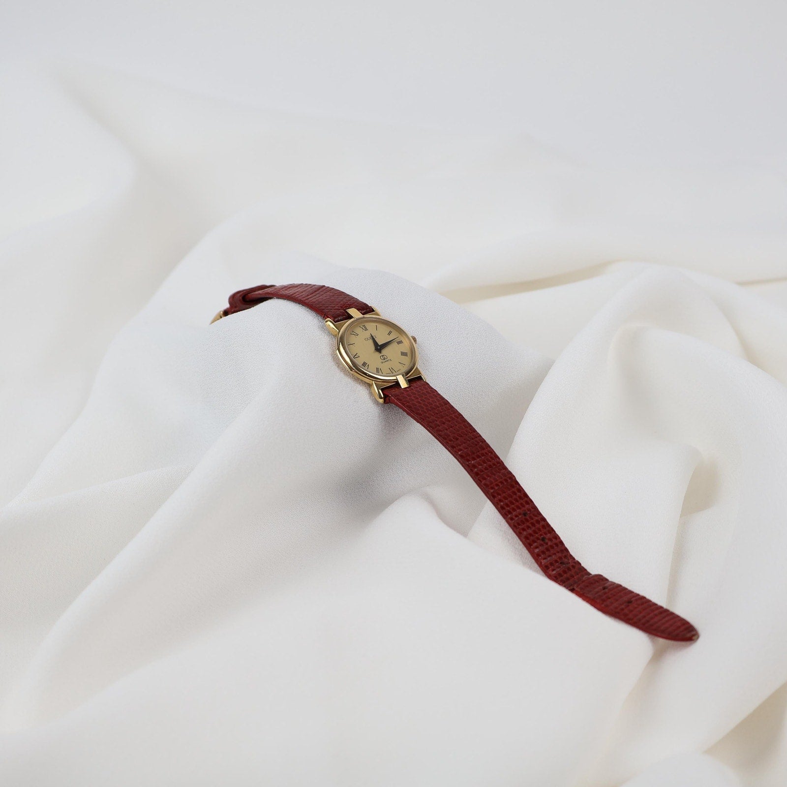 Stunning Vintage Gold Gucci Watch with Red Leather Strap