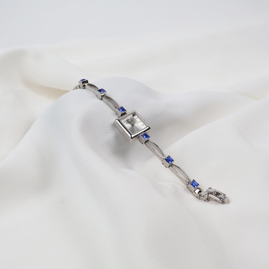 Vintage Silver Nine West Bracelet Watch with Blue Gem Embellishments